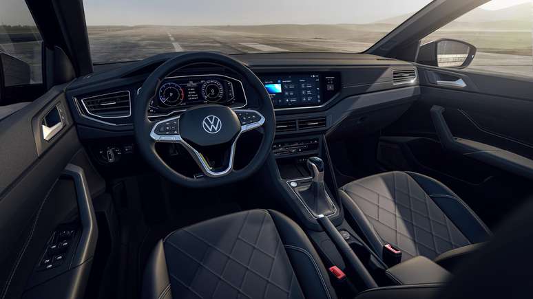 Interior view of a Volkswagen vehicle featuring a modern dashboard with digital displays, a stylish steering wheel, and leather seats.