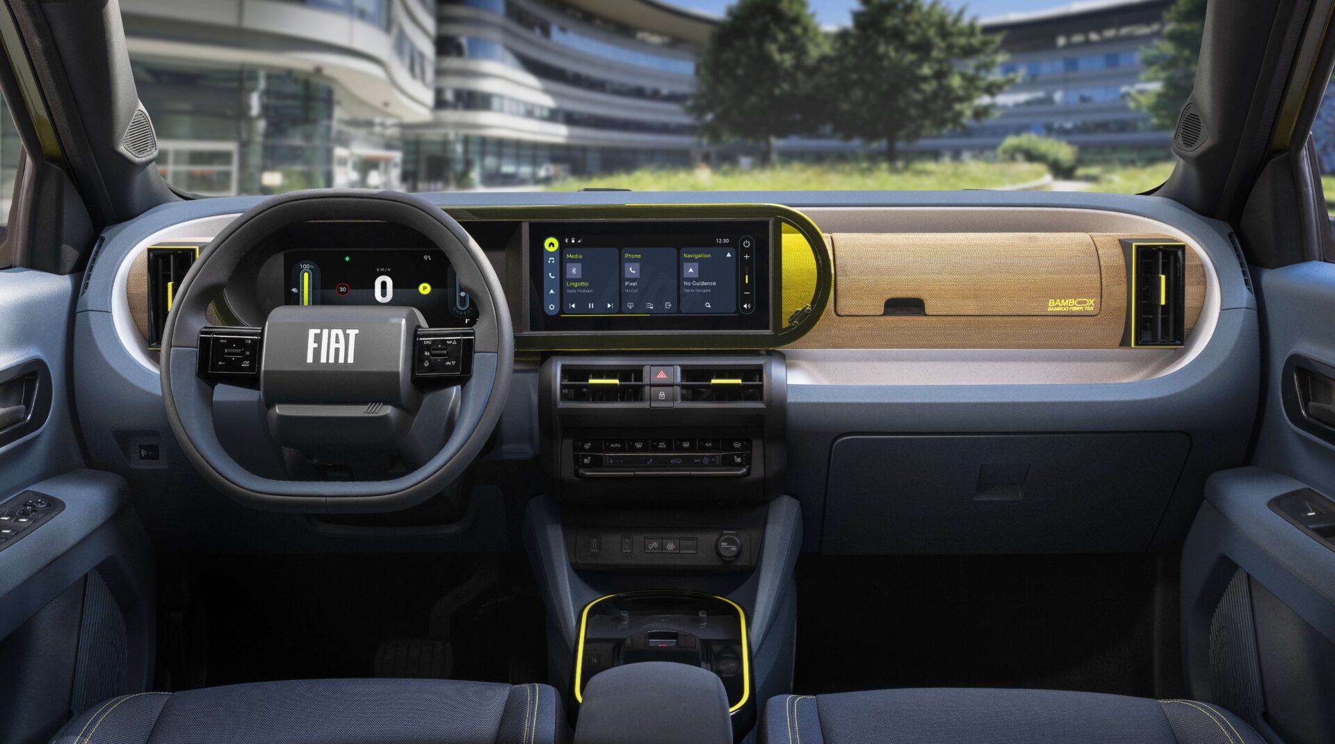 Interior view of a Fiat vehicle showcasing a modern dashboard with digital displays, a steering wheel, and a wooden accent panel.