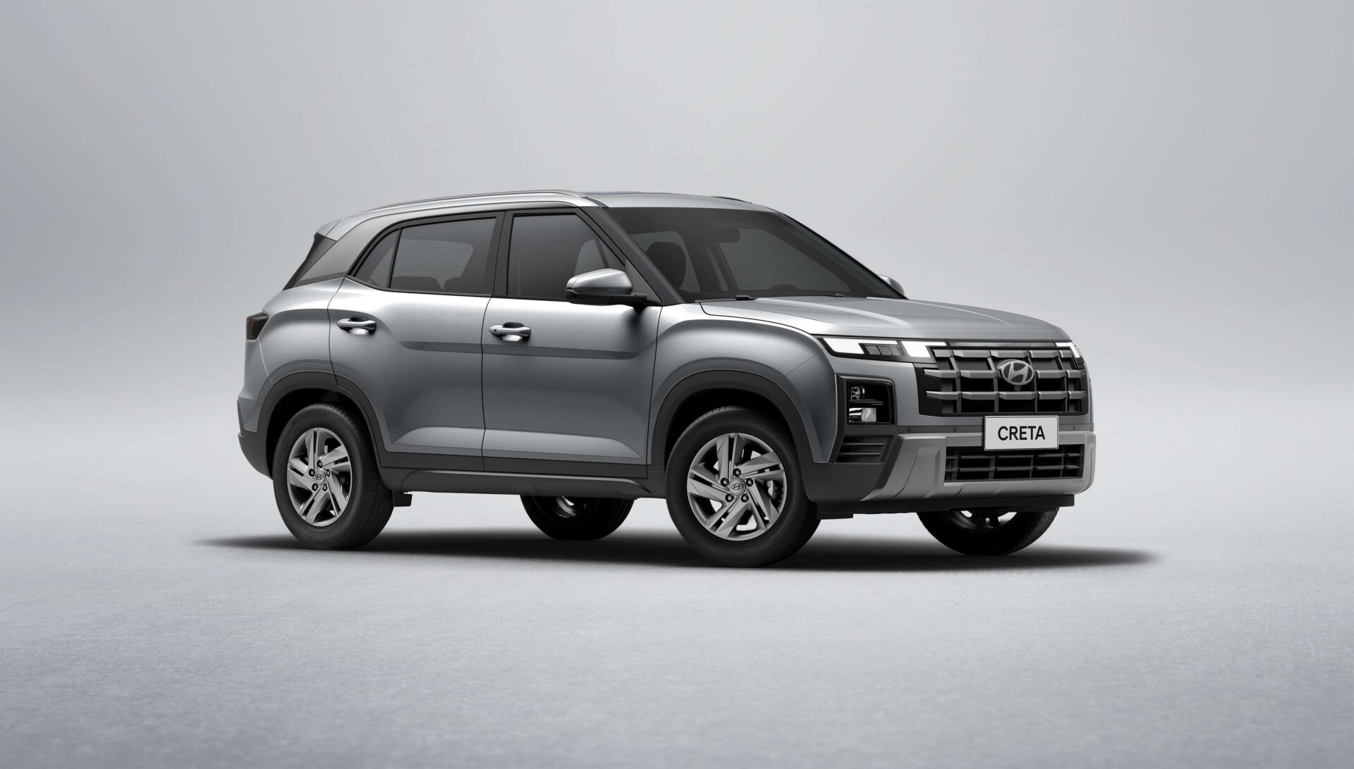 Side view of a gray Hyundai Creta SUV on a neutral background.