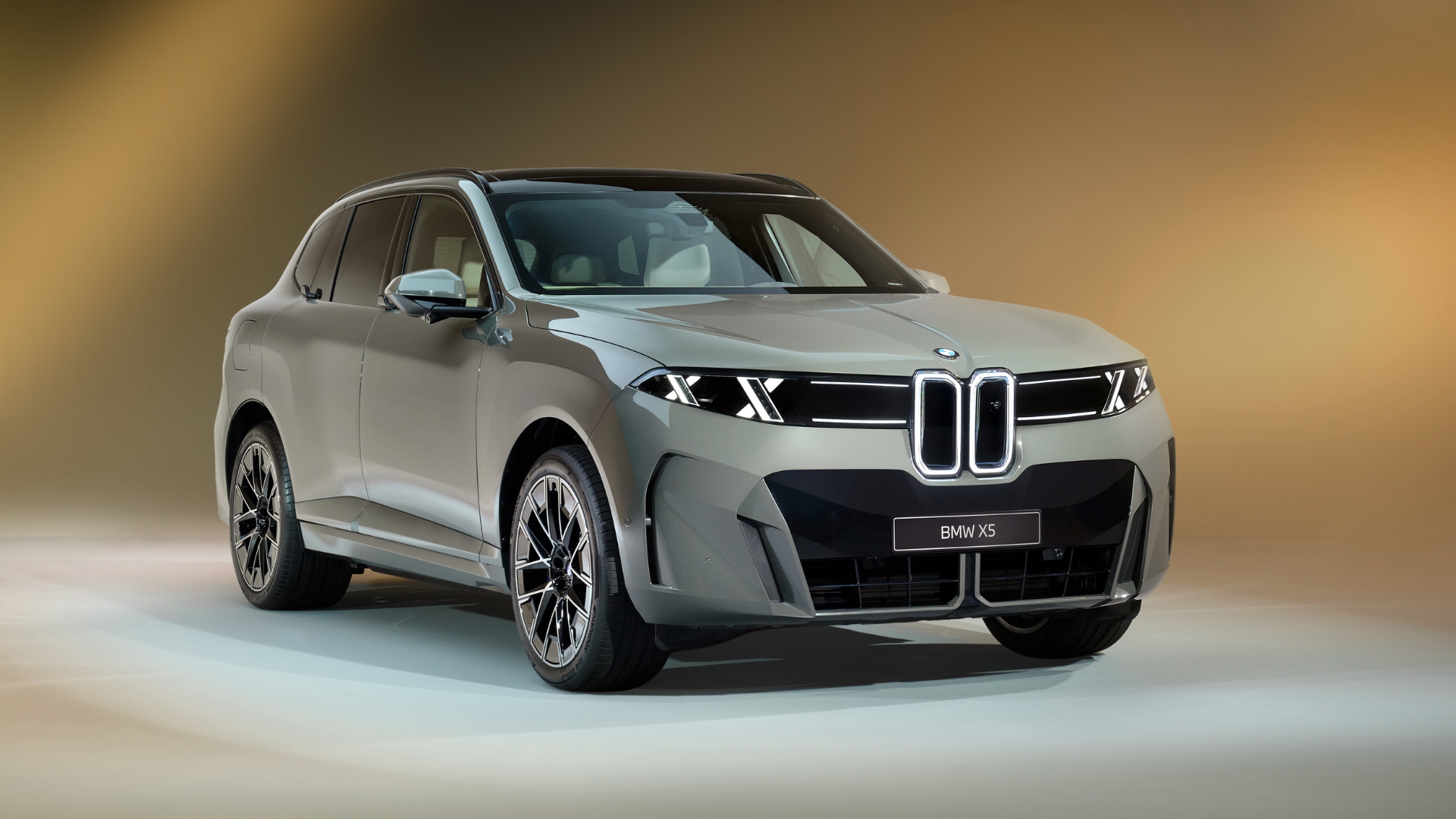 Front view of a gray BMW X5 SUV showcasing its modern design and stylish features.