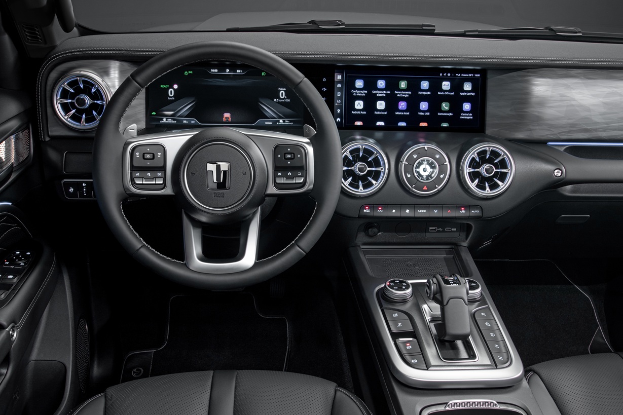 Interior view of a modern car dashboard featuring a steering wheel, digital display, and control panels.