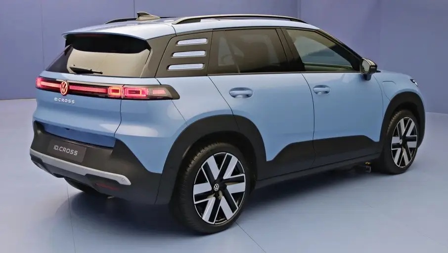 Rear view of a blue Volkswagen ID. Cross SUV, showcasing its modern design and distinctive taillights.
