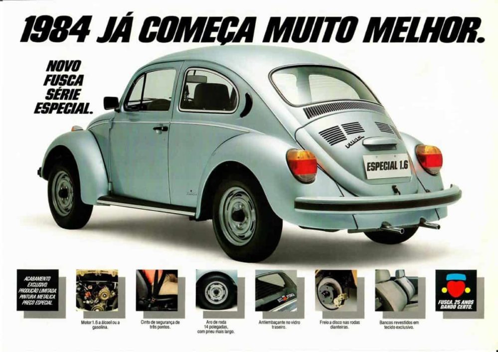 Classic Volkswagen Beetle advertisement featuring a light blue car from the rear, highlighting special features for 1984.