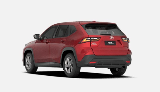 A rear view of a red Toyota vehicle, showcasing its modern design and taillights.